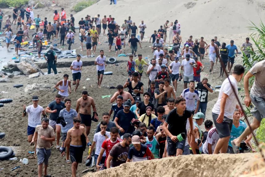 Spain says most of the 50,000 migrants who crossed into its territory from Morocco have returned