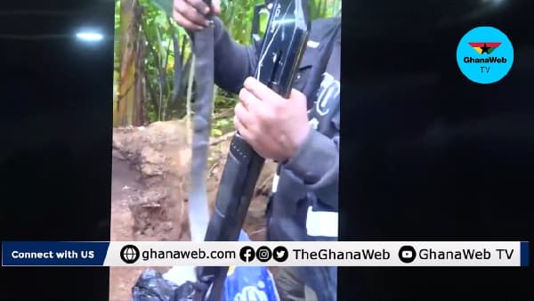 Watch as police dig up AK-47 buried in soil by alleged armed robbery suspects