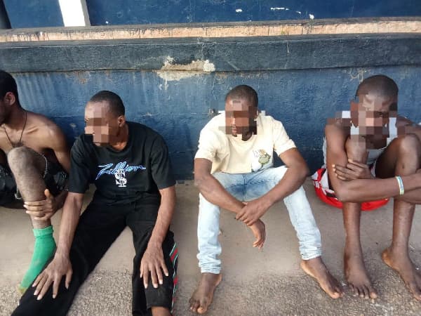 8 arrested for beating man as ‘initiation’ into internet fraud