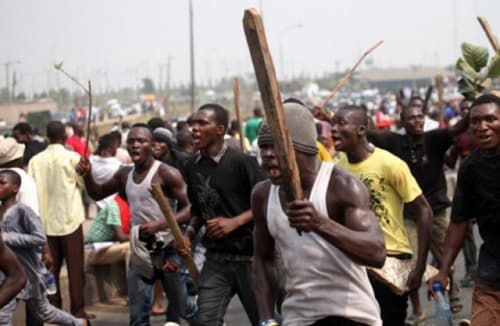 Mob attacks police car after tenant allegedly kills popular 85-year-old landlady at Suminakese