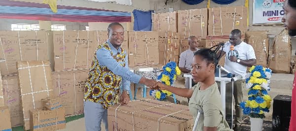 Ellembelle DCE presents items, cash to PWDs