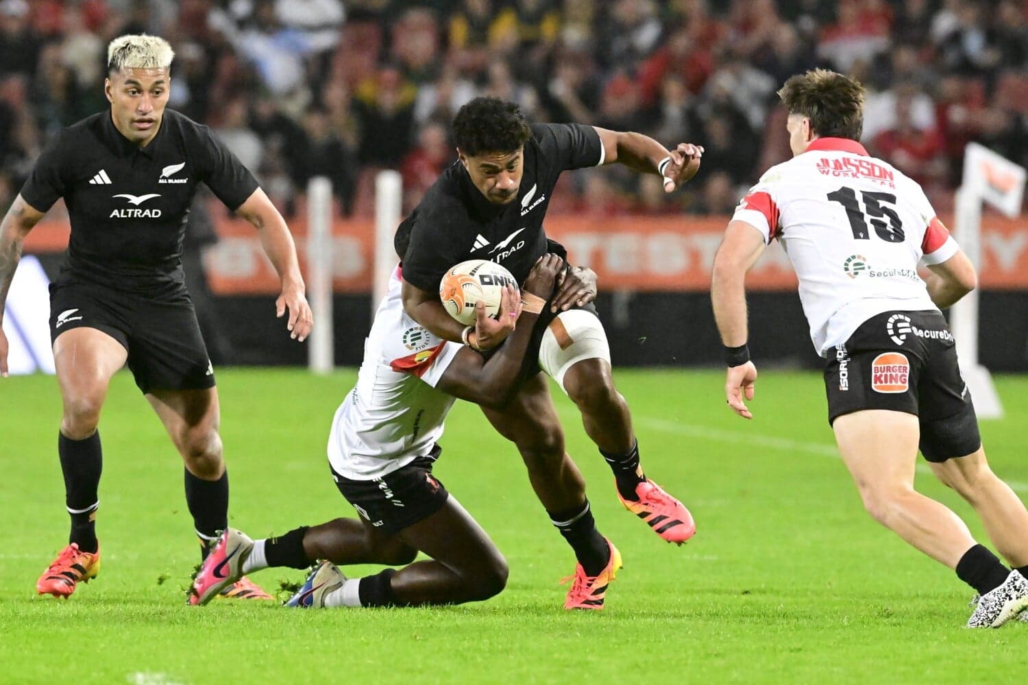 All Blacks edge Lions in 12-try thriller at Ellis Park