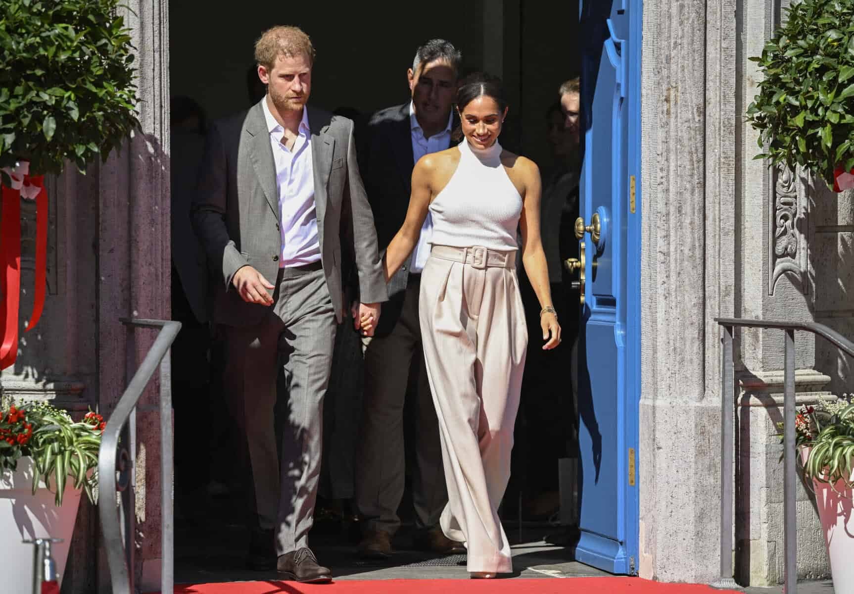 Prince Harry and family arrive back in Britain