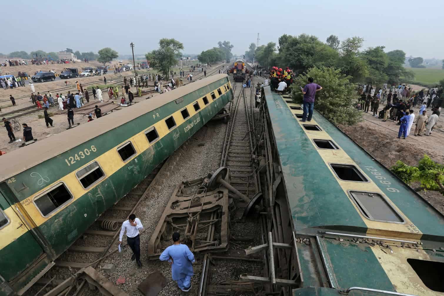 24 hours in pictures: Pakistan train derailment, climate protest in Cape Town and more
