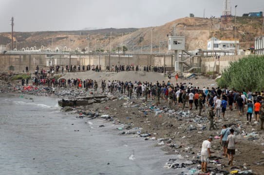 60,000 migrants from Morocco enter Spanish territory after overrunning border.