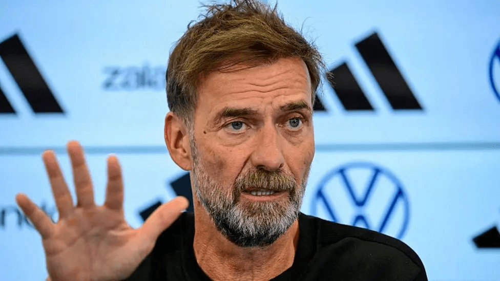 Klopp starts Germany reign by threatening to quit