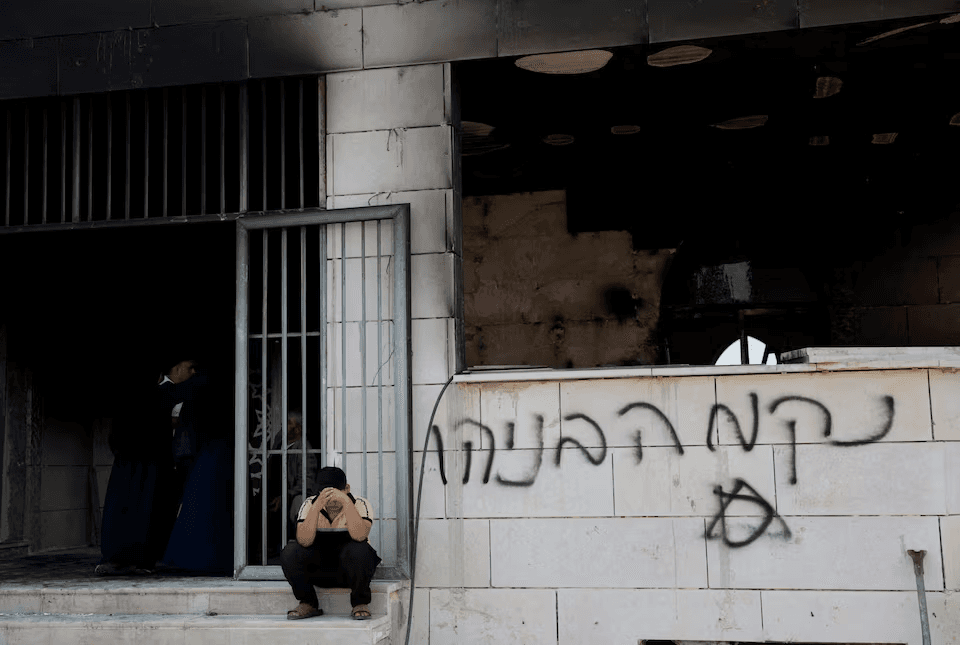 Israeli settlers set fire to West Bank mosques after deadly clash