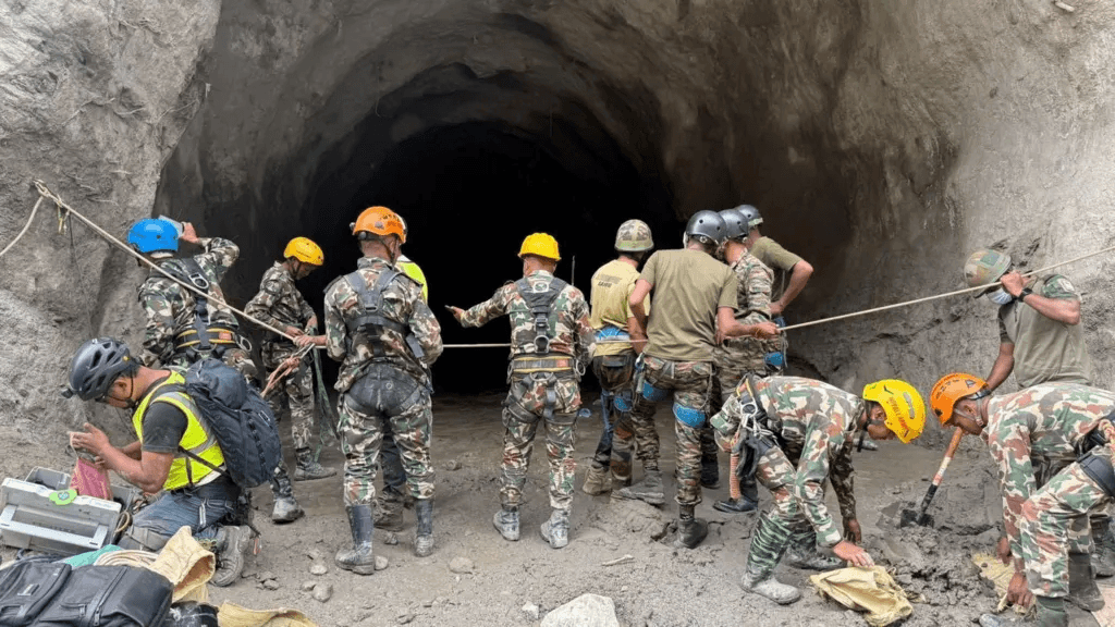 Nepal rescuers blast hillside in search of hydropower workers as families wait anxiously