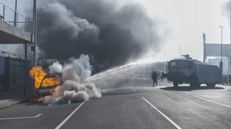 Cars torched and shops looted as anti-migrant violence erupts in South Africa
