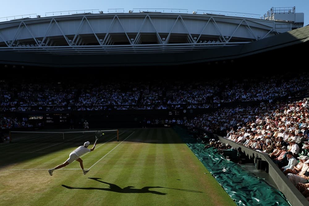 Sinner beats Zverev to retain Wimbledon title after marathon battle