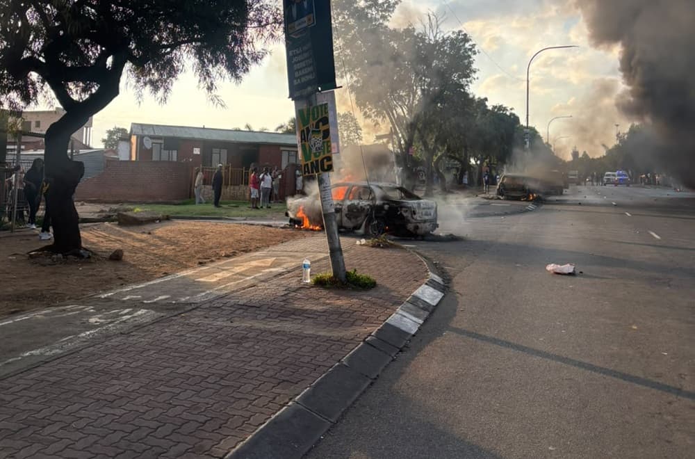 Protests break out in Soweto, several vehicles torched