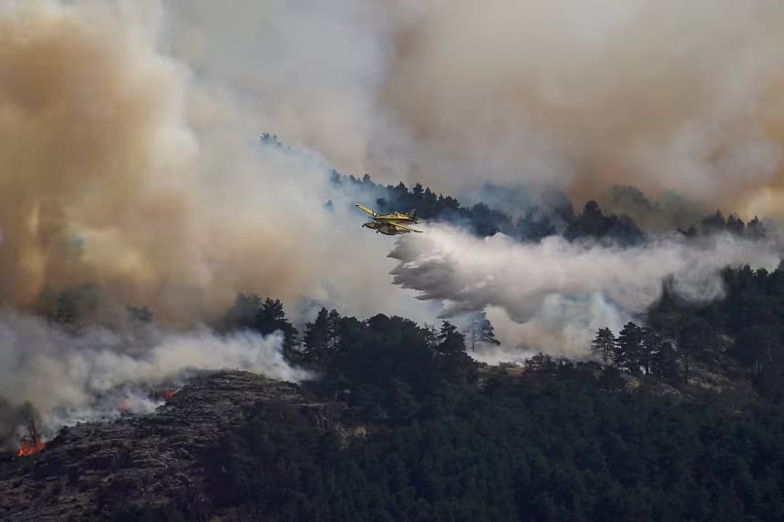 Firefighters battle one of Spain’s biggest-ever wildfires during heat wave across the Mediterranean