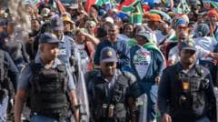 Special police team to investigate killing of an anti-migrant leader in South Africa