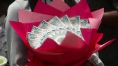 Seven arrested for using Ghanaian banknotes to make 'money bouquets'