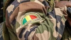 Battle for Mali base has killed dozens of militants, army says