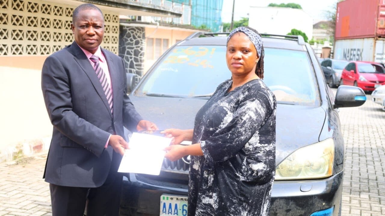 EFCC hands over house, SUV, other forfeited assets to Australian romance scam victim